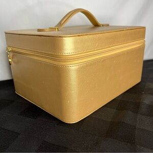 Vintage Estee Lauder Gold Cosmetic Train Case.